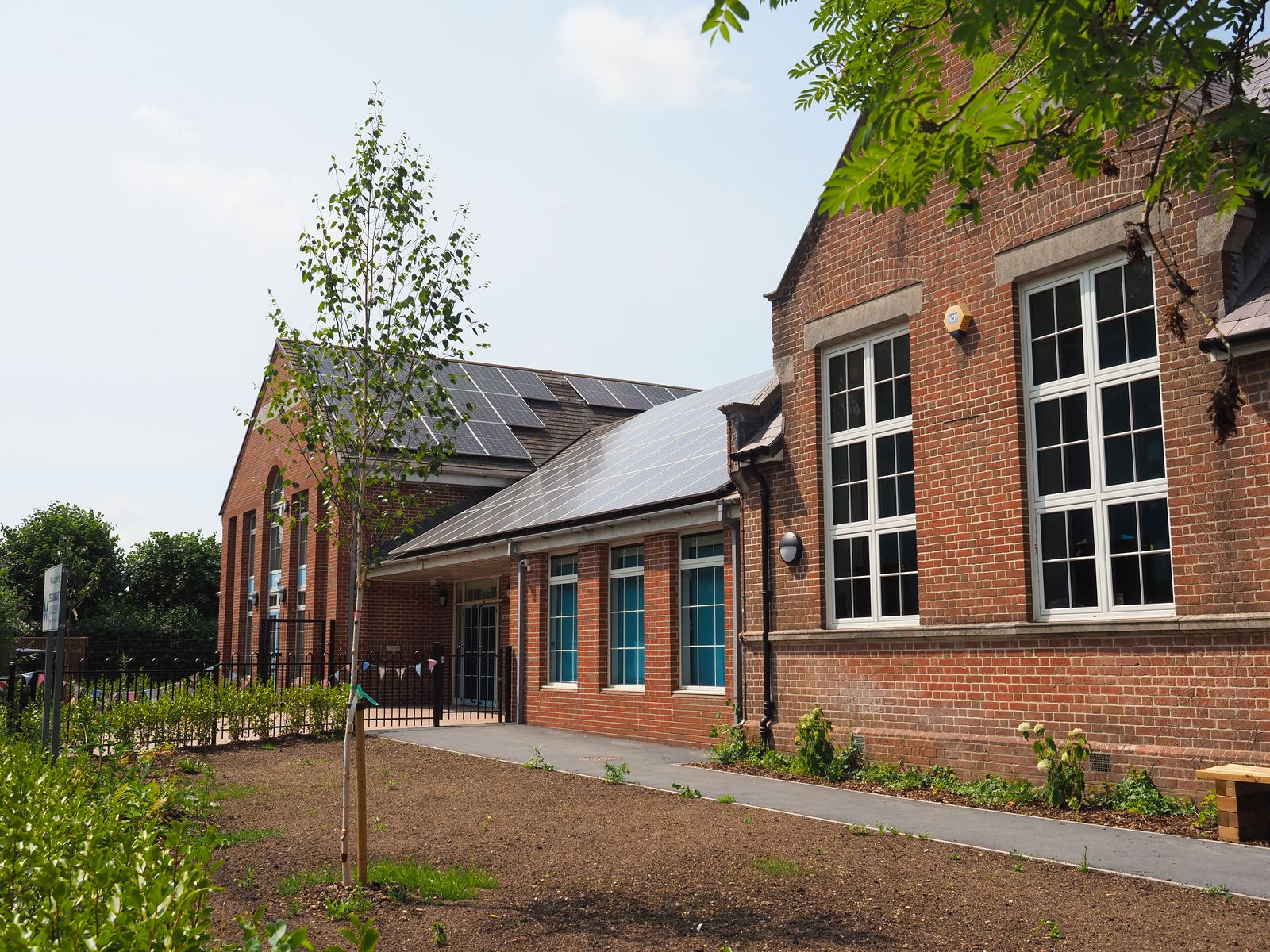 Brick school building with solar panelled roof